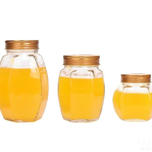 批发新产品独特的古董透明空玻璃瓶瓶果酱六角蜂蜜罐与金盖